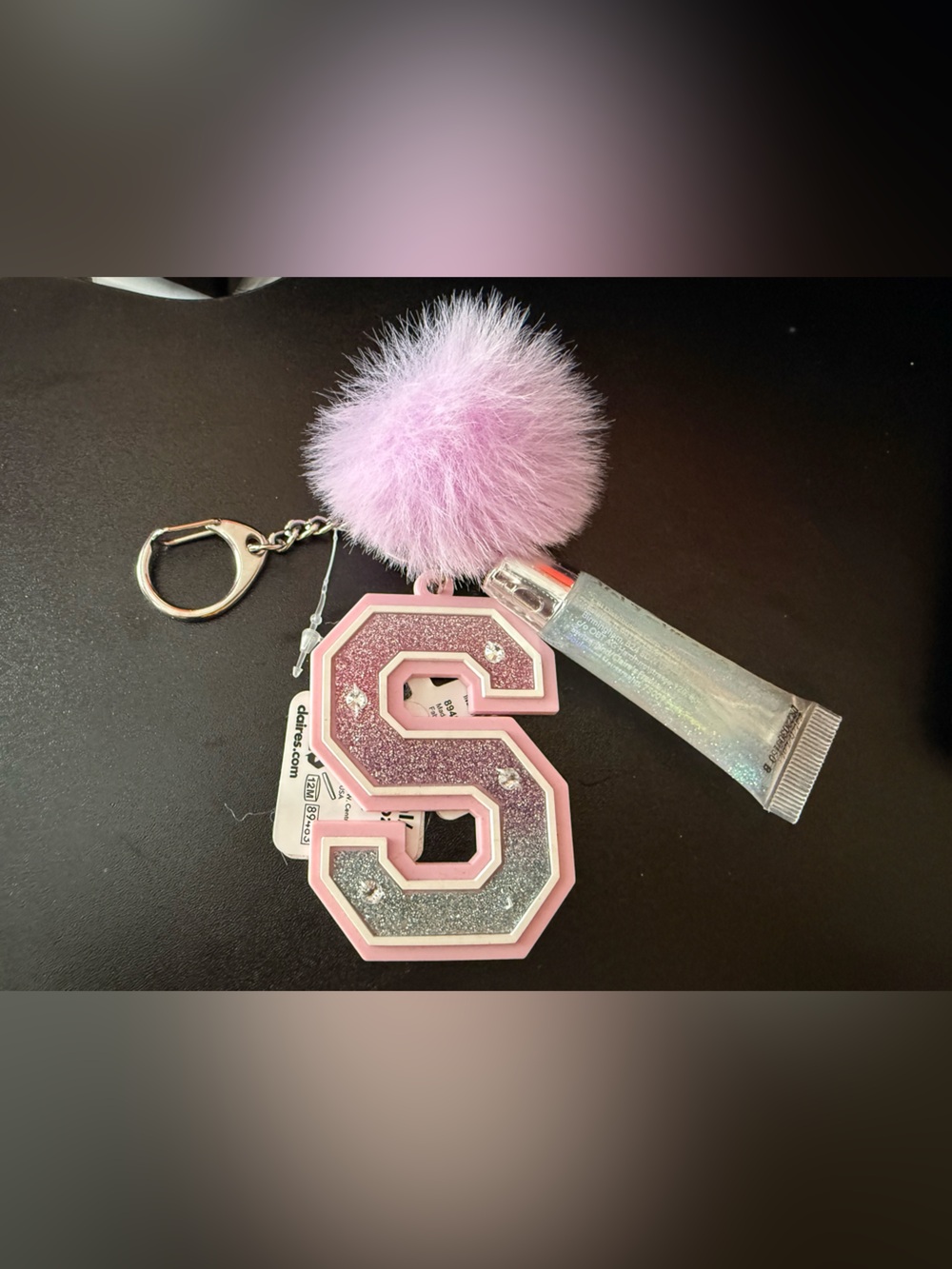 Claire's Pink Glitter 'S' Keychain with Lilac Pom and Iridescent Lip Gloss